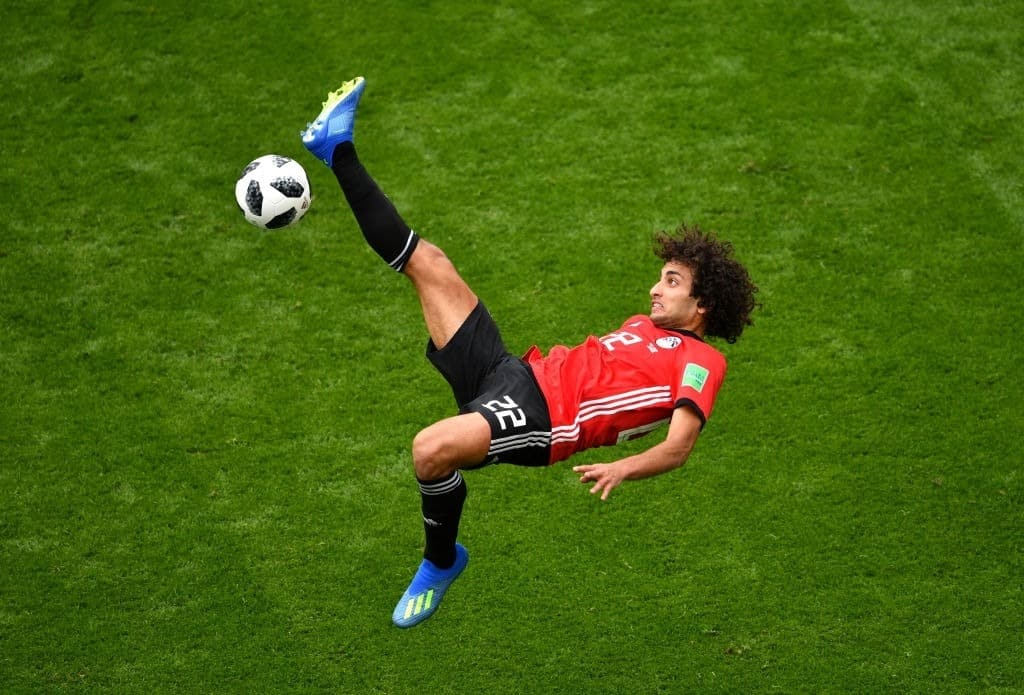YEKATERINBURG, RUSSIA - JUNE 15:  Amr Warda of Egypt attempts an overhead kick during the 2018 FIFA World Cup Russia group A match between Egypt and Uruguay at Ekaterinburg Arena on June 15, 2018 in Yekaterinburg, Russia.  (Photo by Dan Mullan/Getty Images)