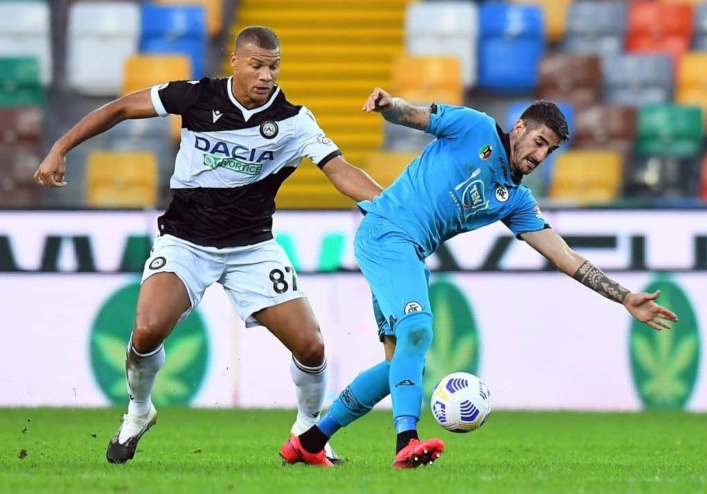 UDINE, ITALY - SEPTEMBER 30: Sebastien De Maio of Udinese Calcio competes for the ball with Alessandro Deiola of Spezia Calcio during the Serie A match between Udinese Calcio and Spezia Calcio at Dacia Arena on September 30, 2020 in Udine, Italy. (Photo by Alessandro Sabattini/Getty Images)