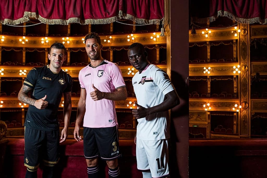 (L-R) Aleksandar Trajkovski, Andrea Rispoli and Carlos Embalo pose with US Citta di Palermo new kit  at Teatro Massimo on July 7, 2016 in Palermo, Italy.