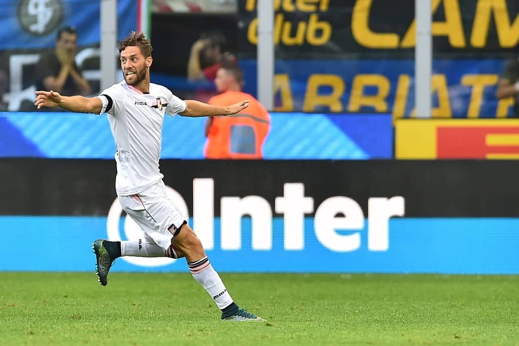 Palermo's defender from Italy Andrea Rispoli celebrates after scoring a goal during the Italian Serie A football match Inter Milan vs Palermo at "San Siro" Stadium in Milan on August 28, 2016. / AFP / GIUSEPPE CACACE        (Photo credit should read GIUSEPPE CACACE/AFP via Getty Images)